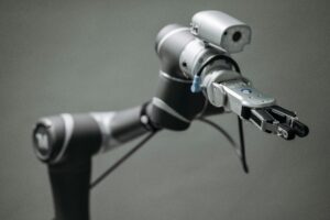 Close-up view of a robotic arm equipped with a video camera, showcasing modern technology.